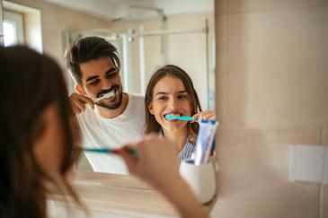 couple brushing teeth | chelsea heights dentist