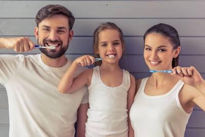 family brushing teeth | chelsea heights dentist