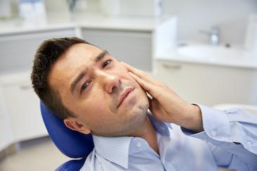 man with jaw pain in chelsea heights